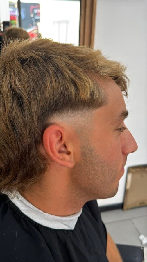 Corte con mechas y fade